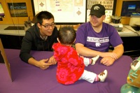 Weihong and Chester answered questions about proteins to a 8-month old